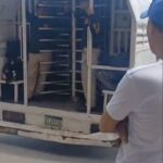 Migración llenó dos camiones de haitianos indocumentados en el establecimiento chino Mina Super Tienda de Los Alcarrizos